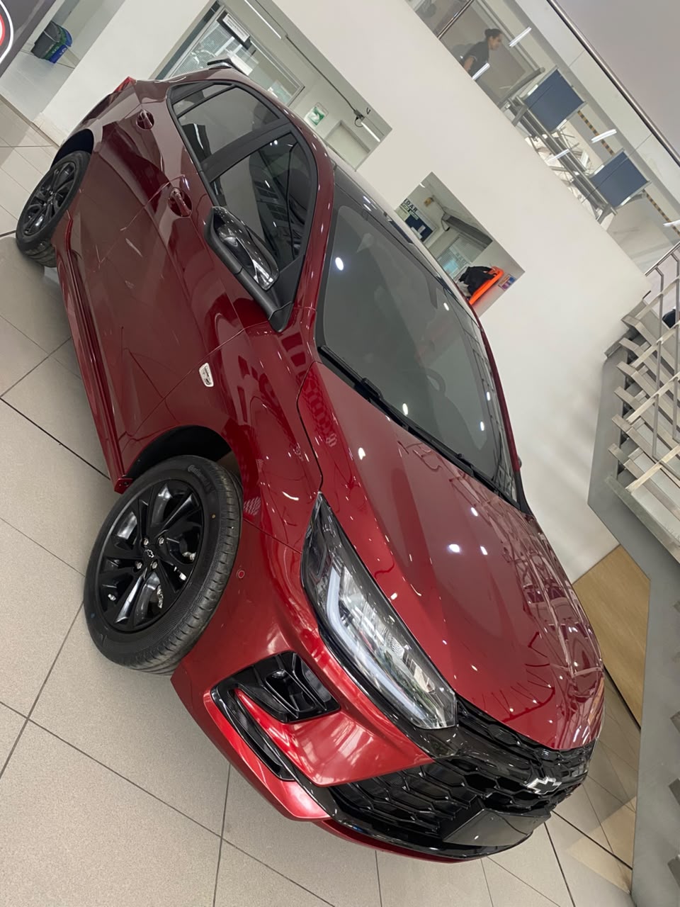 Chevrolet Onix RS rojo en FACILI MARKARS